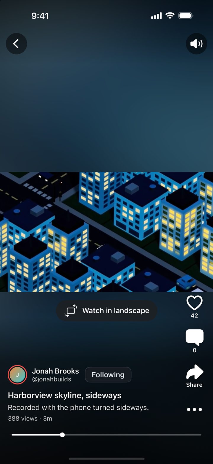 A landscape clip of a city at night in the clip viewer, with like, comment and share buttons and Watch in landscape.